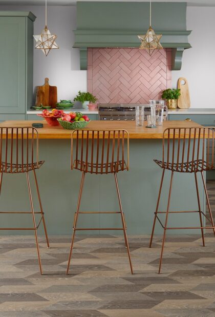 Architex PUR heterogeneous vinyl flooring in a patterned design in a bar and kitchen interior