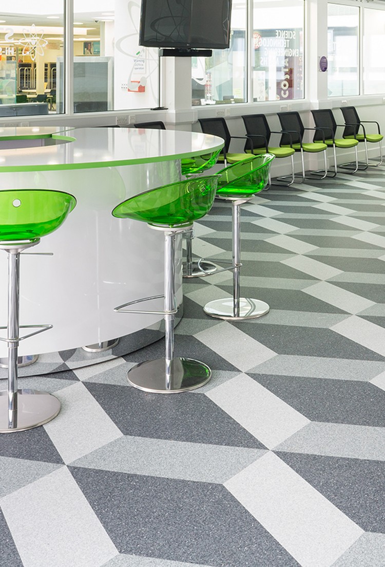 Classic Mystique PUR homogeneous vinyl flooring in a grey geometric pattern beneath a cafe counter