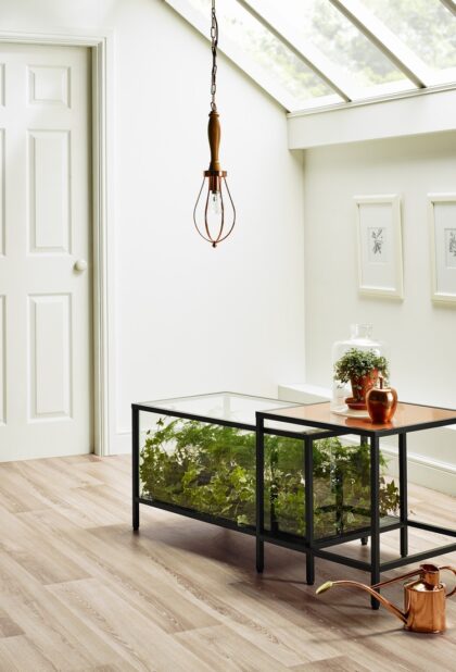 Designatex PUR heterogeneous vinyl flooring in a light oak plank design in a domestic interior