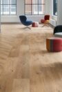 Silentflor PUR acoustic vinyl flooring in an oak plank design in an office interior